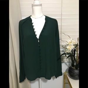 3/ $25 Forrest green blouse.